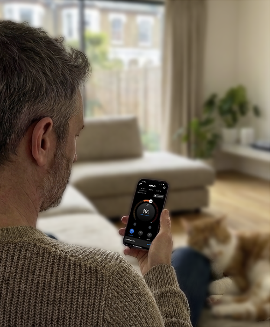 Image of a man using the ATAG ONE Zone app