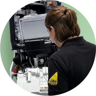 Image of a boiler being serviced